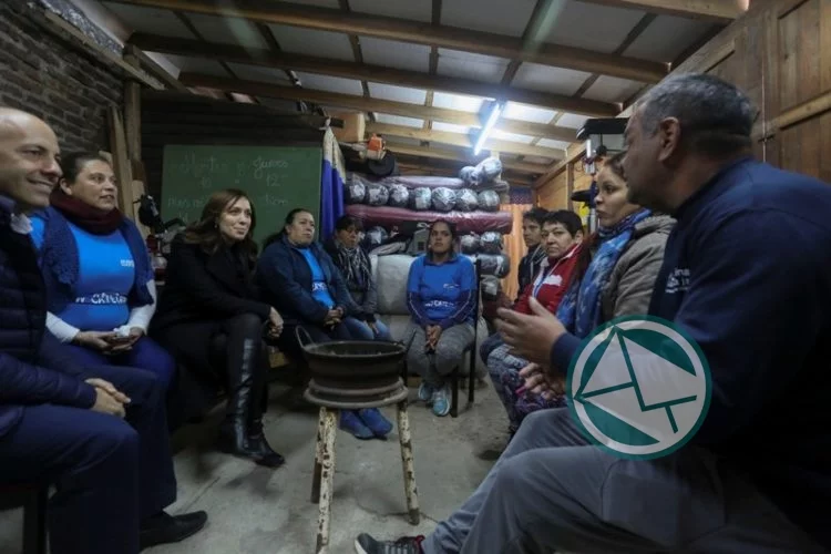 Vidal y Docuté con cooperativistas de Pilar